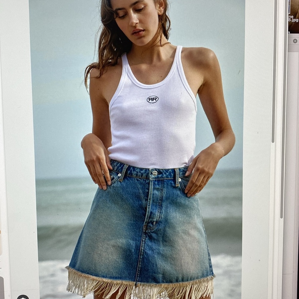 Ragdoll mini denim skirt with fringe